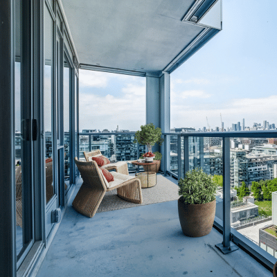 Suite balcony with city views at 39 Niagara in Toronto.